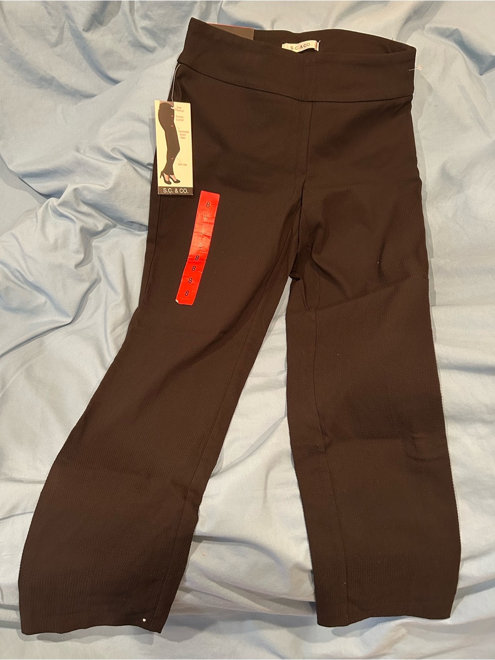Brand new with tags black dress pants—never worn